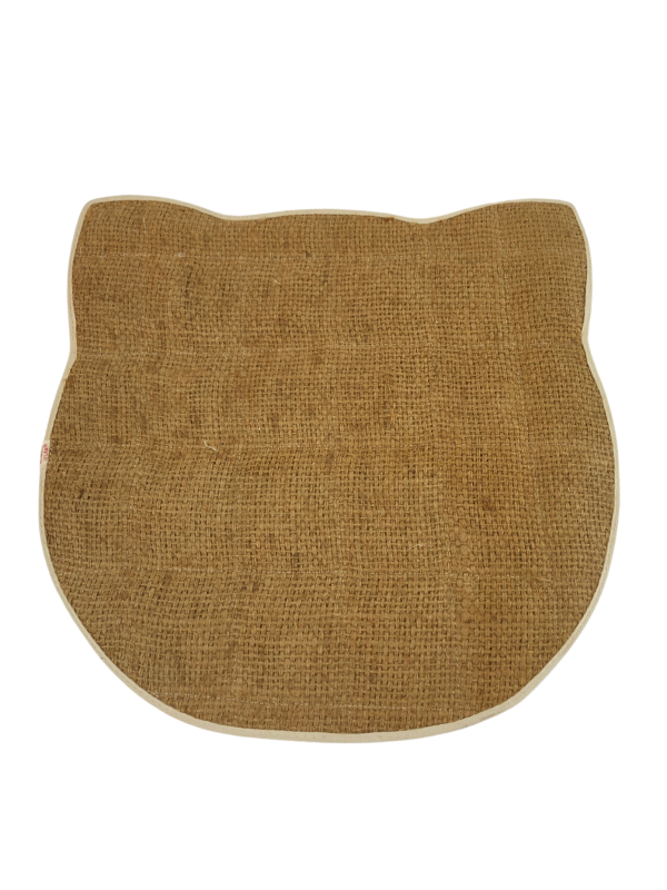 Cat relaxing on a loofah mat, showcasing its eco-friendly and non-toxic qualities, ideal for scratching and comfort."